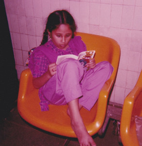 RajaniAge8-Reading-in-Airport-01